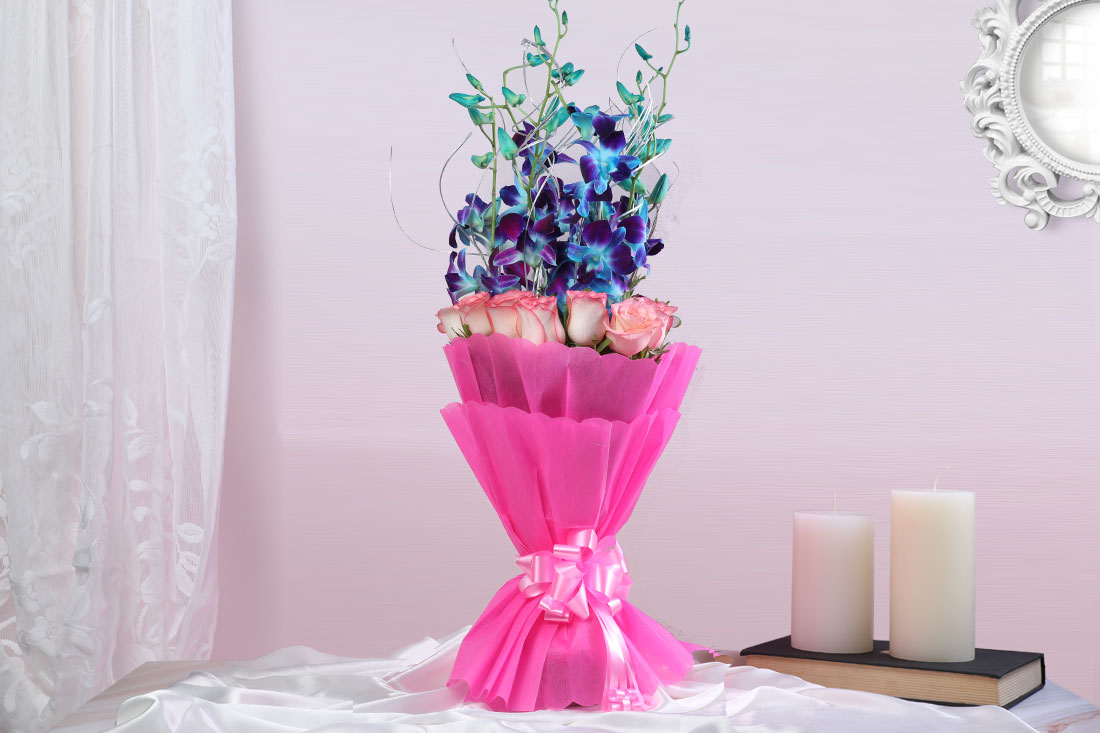 Bunch of 6 Blue Orchids and 10 Pink Roses Order Now