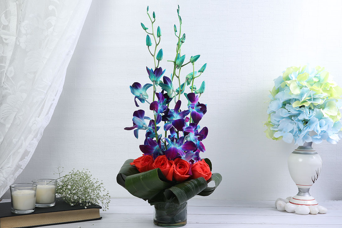 Buy Orchid and rose bouquet