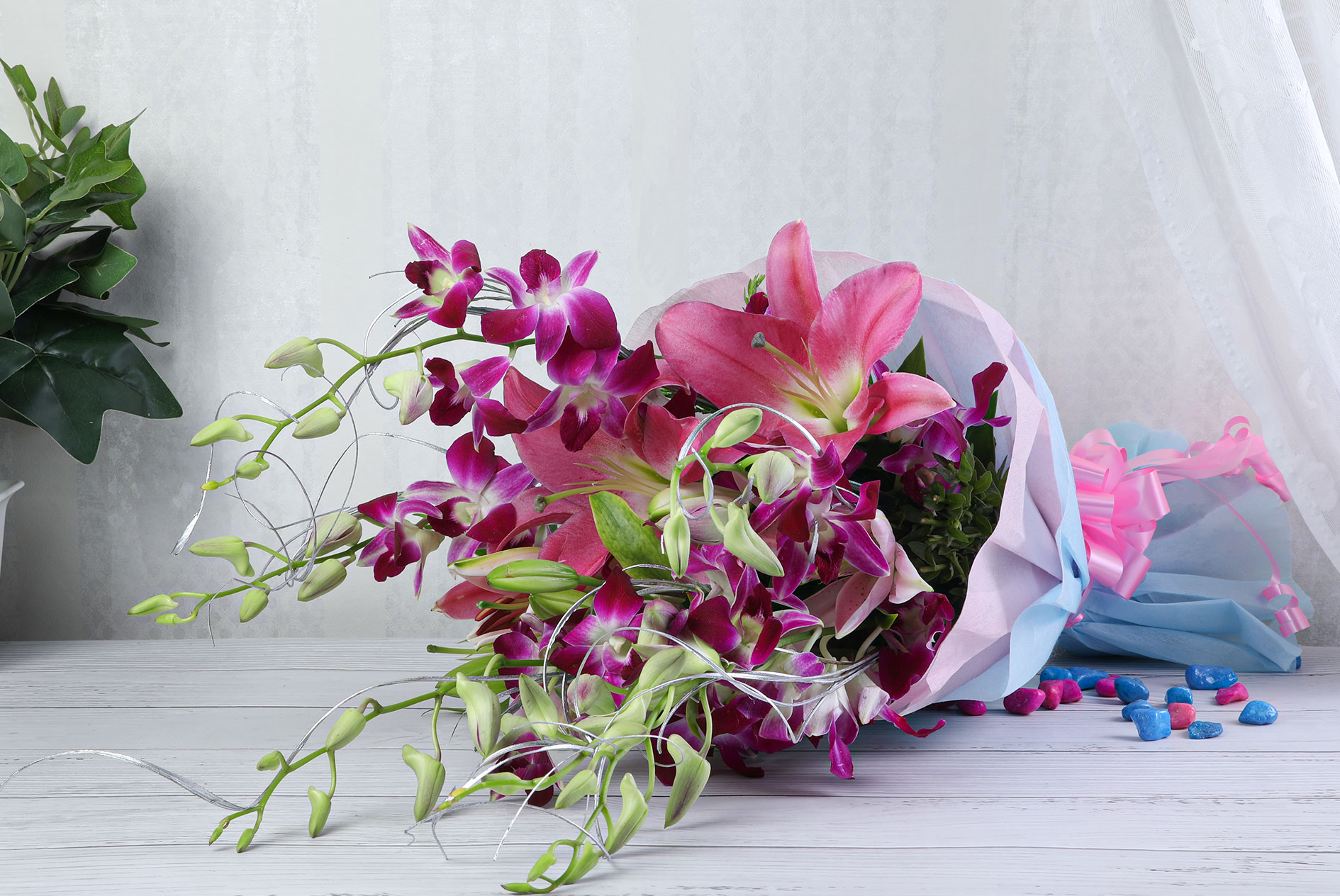Order Bouqet of 2 Pink Lilies and 5 Purple Orchids