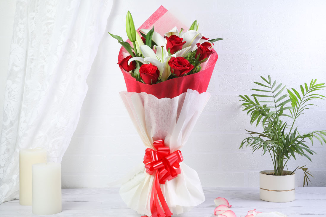 Buy Bunch of 8 Red Roses & 2 White Lilies Online