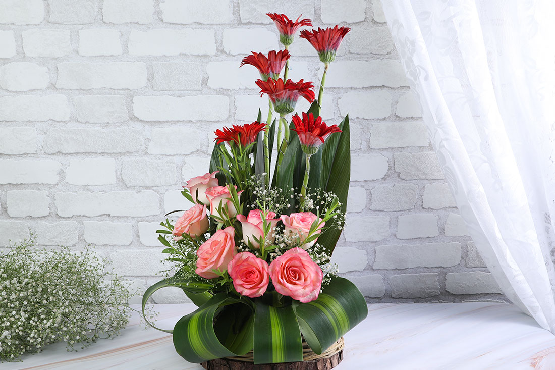 Pink Roses with Red Gerberas in a Basket Buy Online