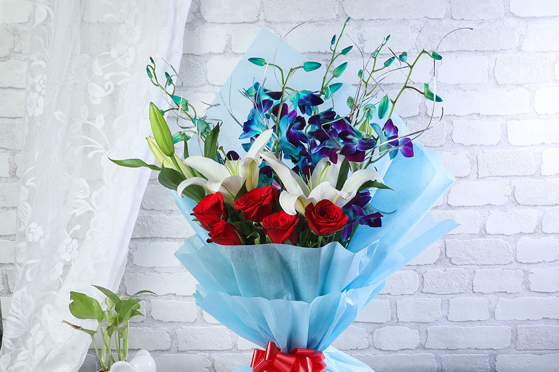 Order Bouquet of 6 Red Roses  2 White Lilies & 6 Blue Orchids Online