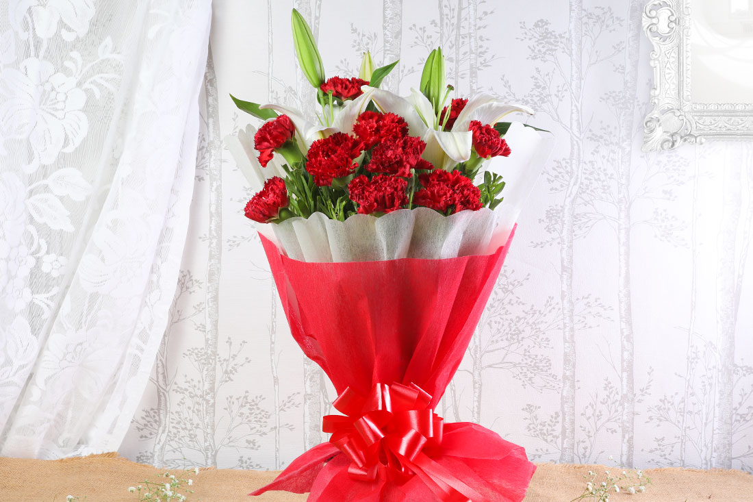 Send 8 Red Carnations with 2 White Oriental Lilies Online in India