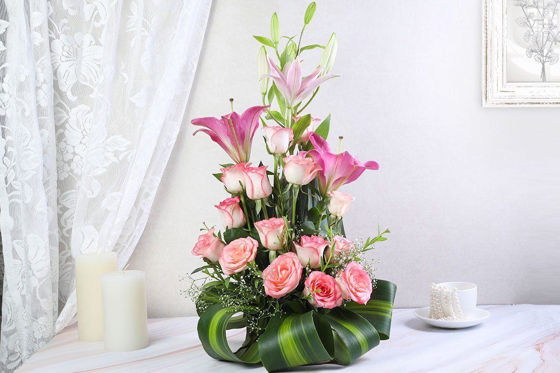 Pink Rose With Lily  in a Basket Online