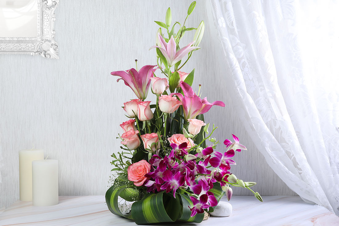 Pink rose and orchid bouquet Send Now