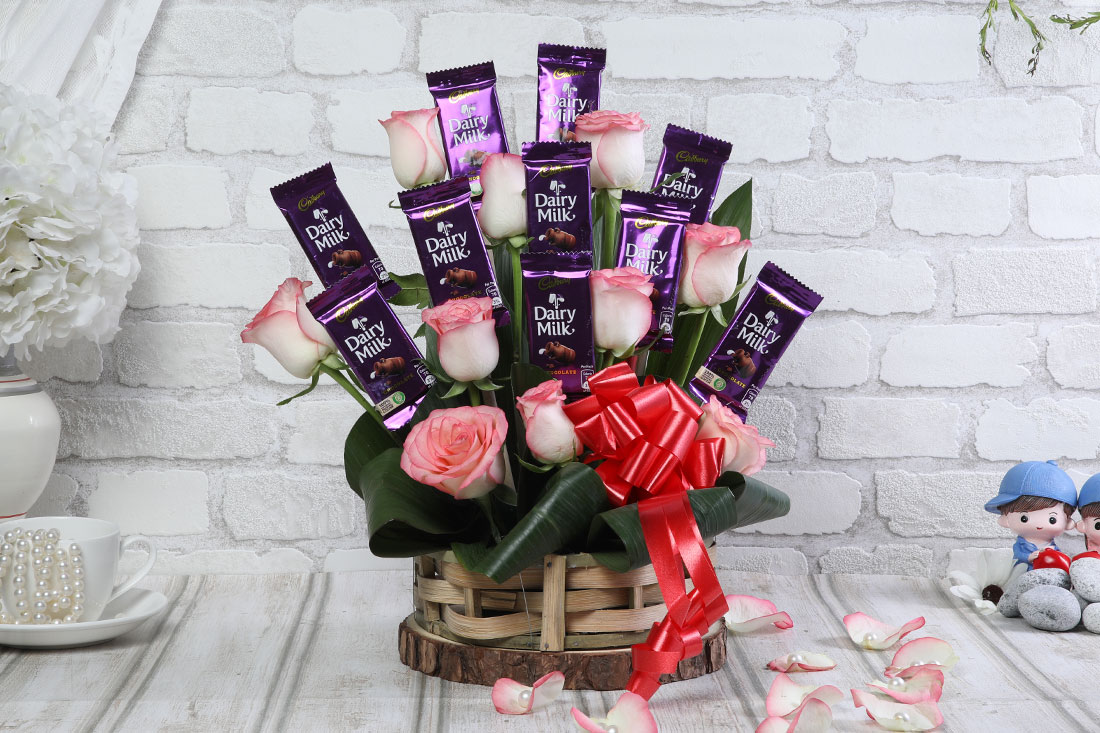 Basket of 10 Dairy Milk Chocolates & 10 Roses