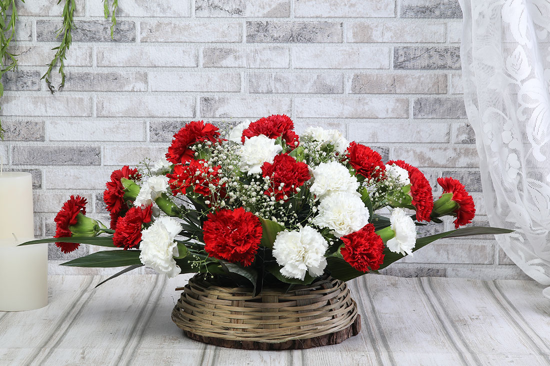 Send Basket of 12 Red And 12 White Carnations