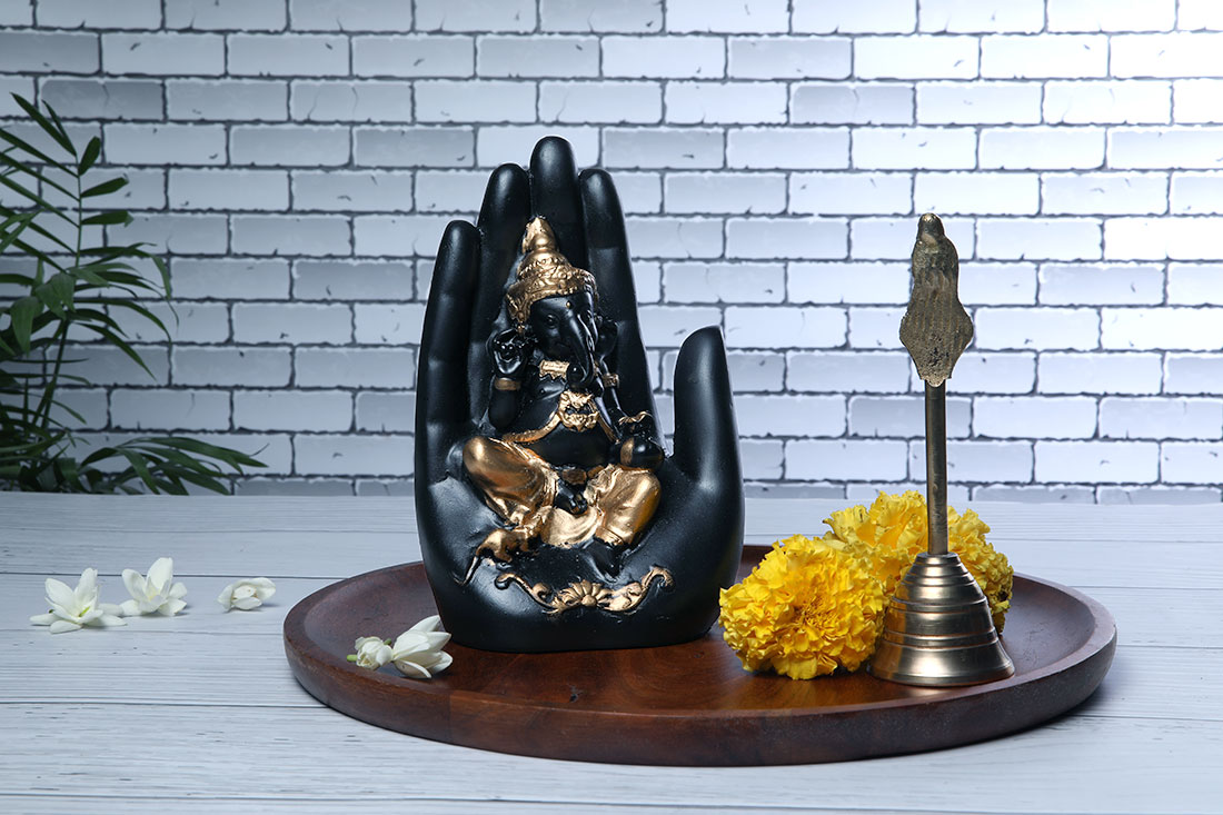 Black and golden lord Ganesha idol Delivery