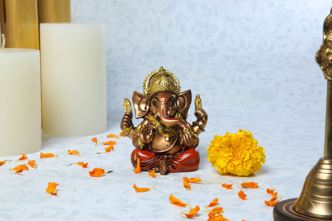 Golden Ganesha Idol Delivery