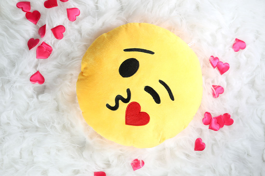 Order Kiss emoji pillow