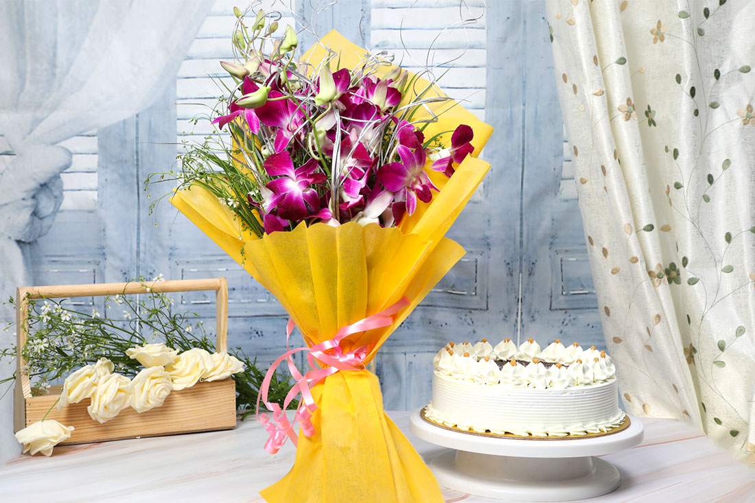 Send Enchanting Flower & Cake