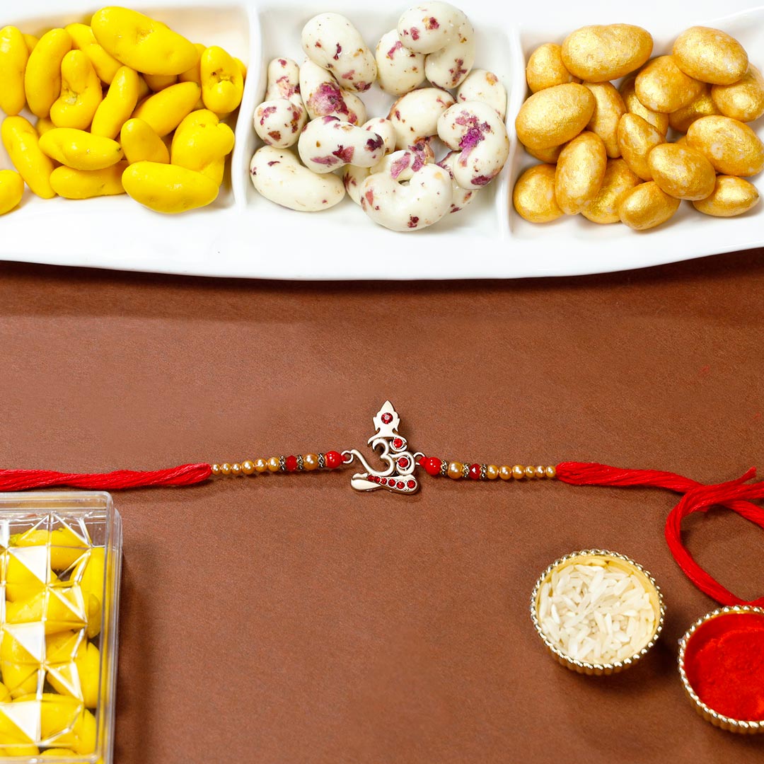 Beautiful Om Rakhi With Kaju Malai Combo