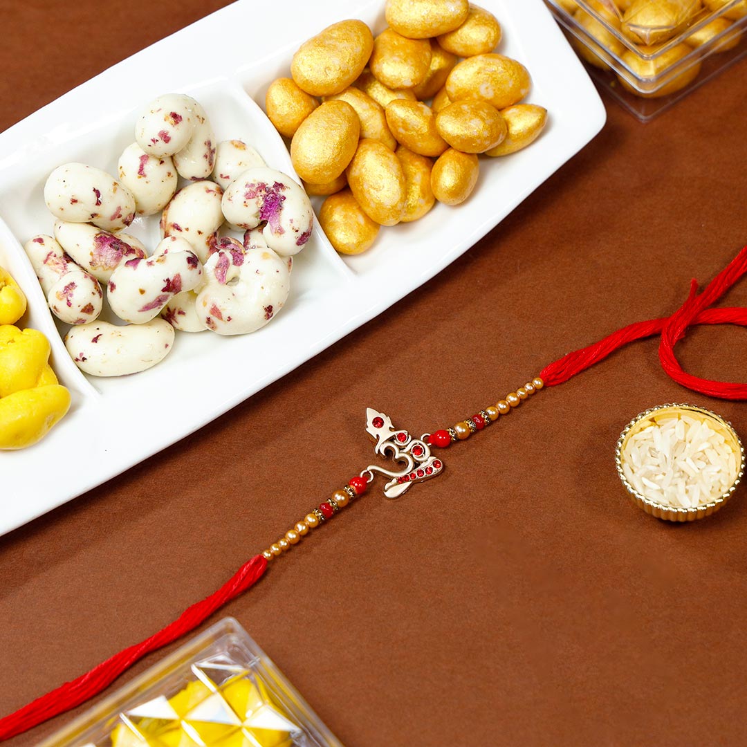 Beautiful Om Rakhi With Kaju Malai Combo