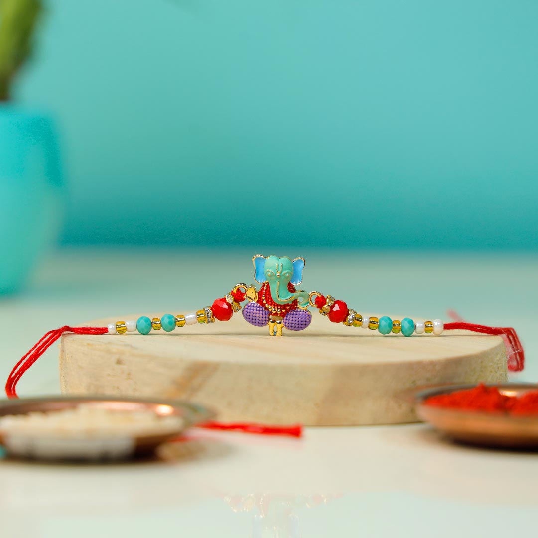 Creative Ganpati Rakhi With Bamboo Plant