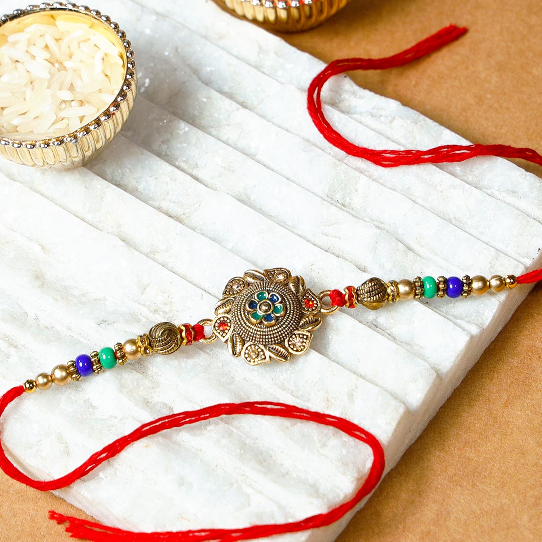 Designer Encarved Metal Rakhi & Pista Barfi