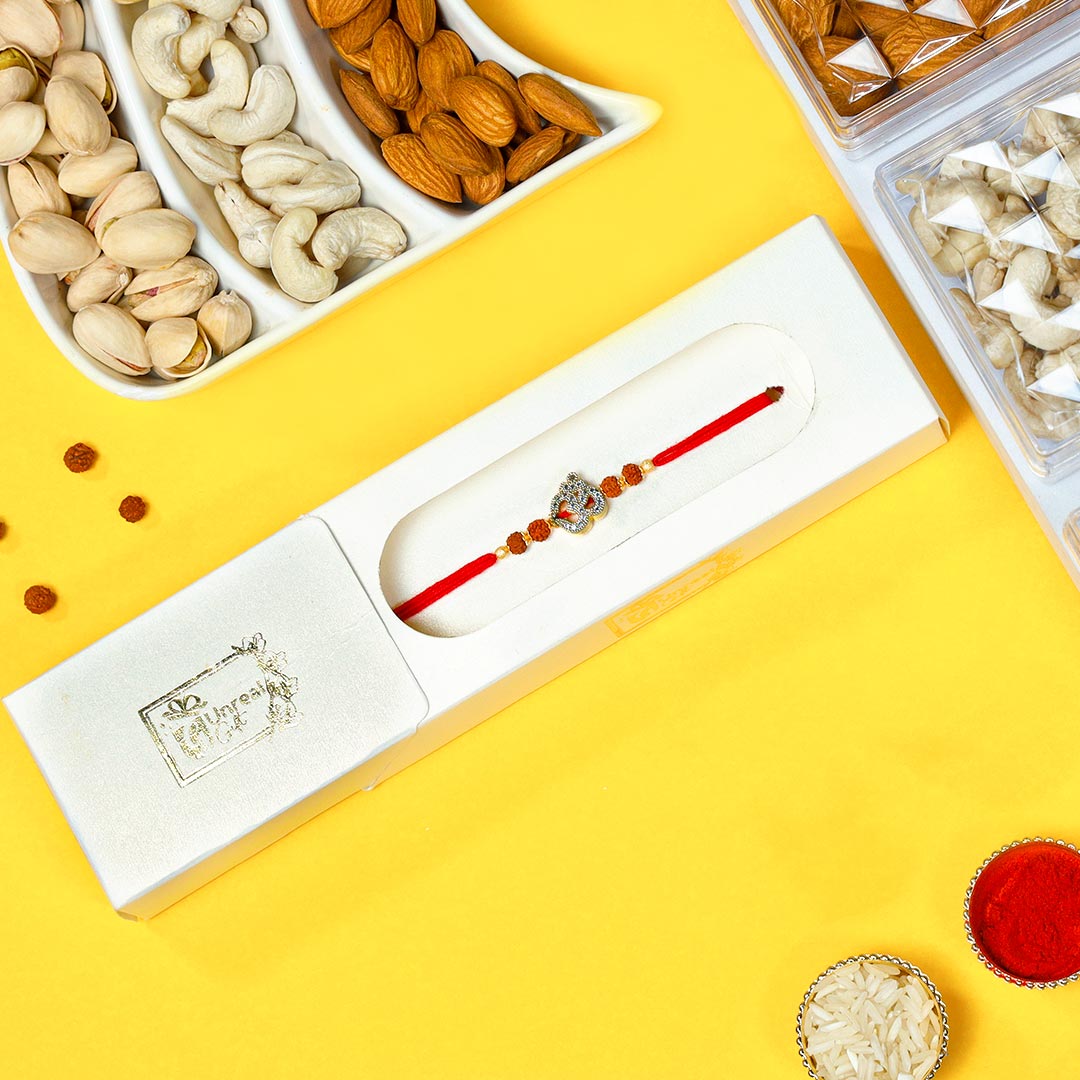 Buy Devotional Om Rudraksha Rakhi with dry fruits mix