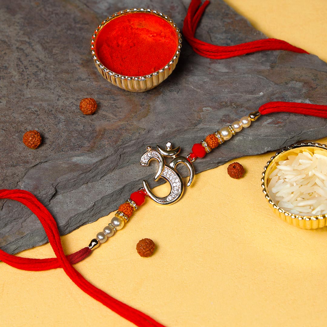 Elegant Diamond Om Rakhi Order Now