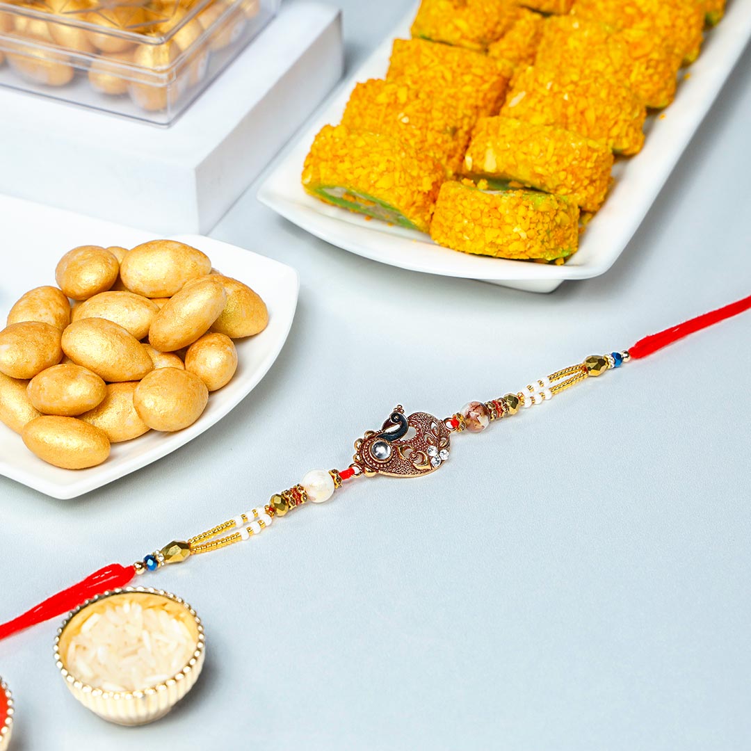 Elegant Mauli Rakhi With Pista Sweets N Almonds Saffaire