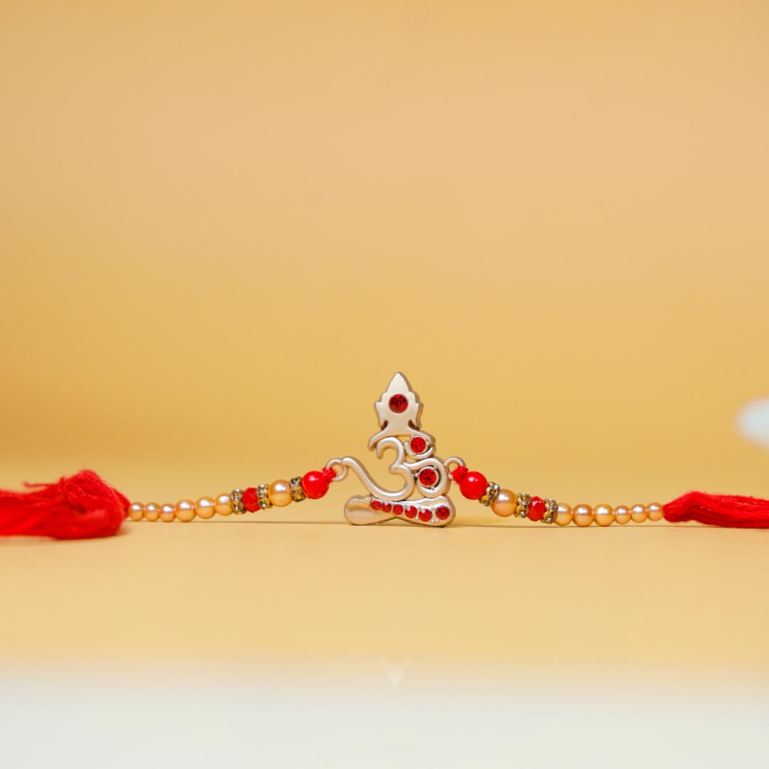 Elegant Om Rakhi With Money Plant