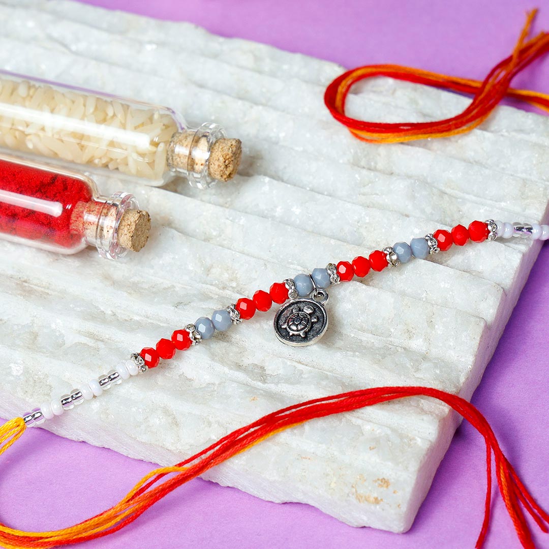 Elegant Ornament Rakhi With Milk Chocolate & Almonds