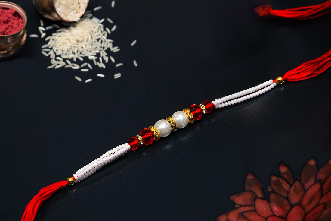 Embedded pearl rakhi Buy Online