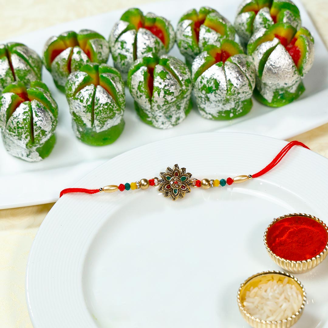 Buy Embedded Stone Rakhi & Kaju Phool Sweets Online