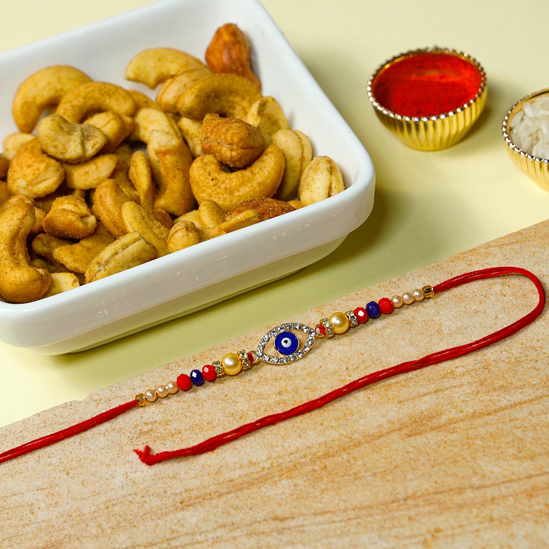 Send Evil Eye Diamond Rakhi with Roasted Dry Fruits Online