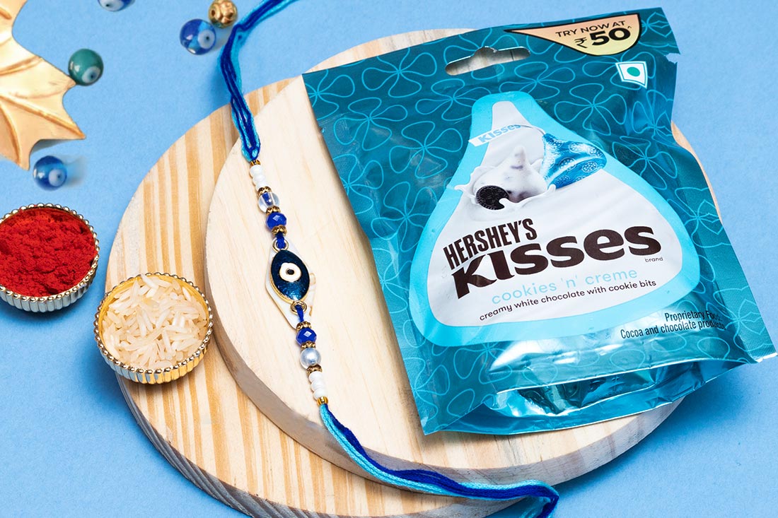 Send Evil Eye Rakhi And Chocolate Combo Online