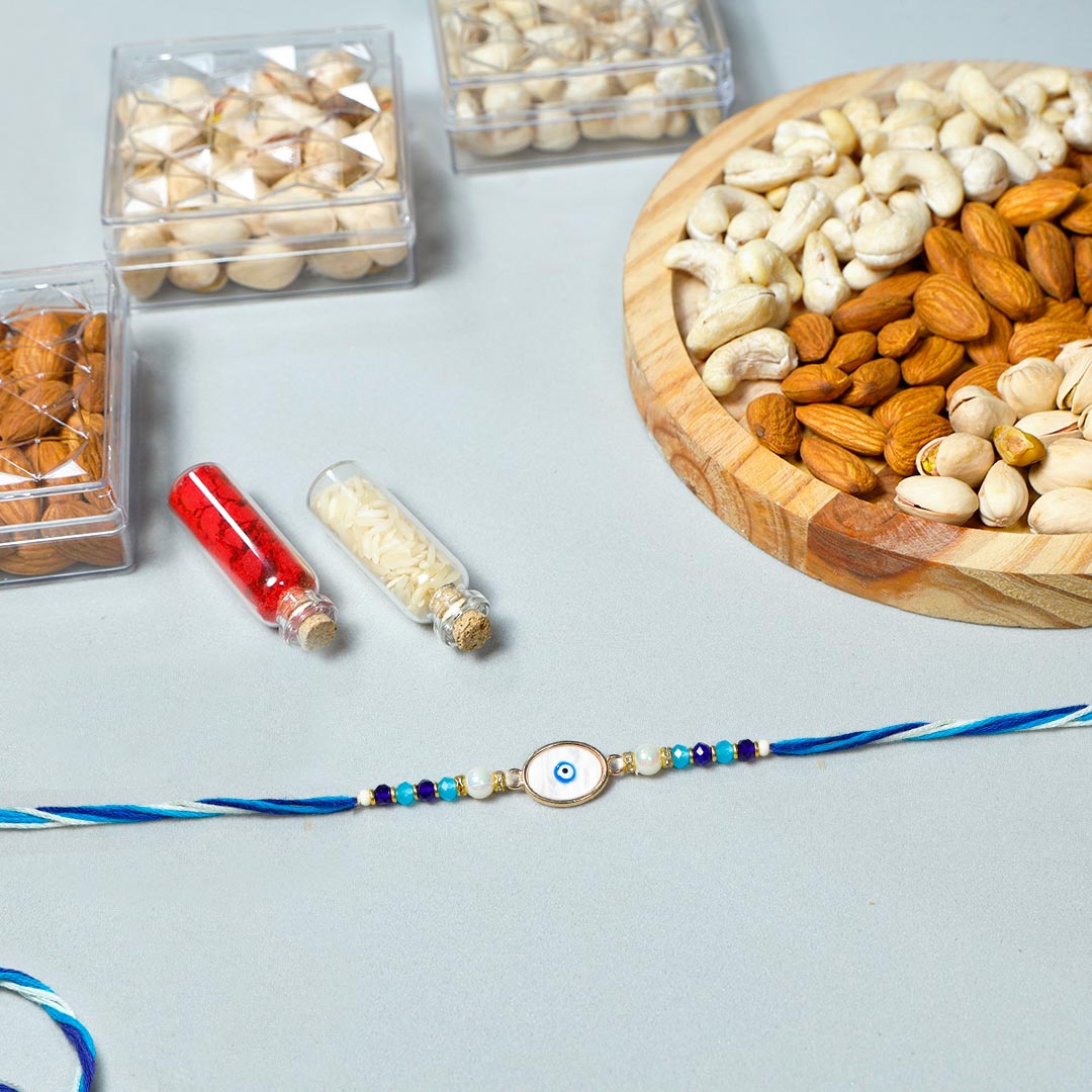Order Evil eye rakhi with Assorted dry fruits plate