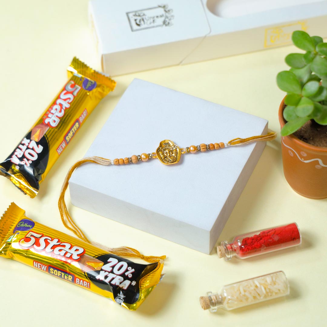 Buy Ganesha Rakhi With Jade Plant N Chocolates Online