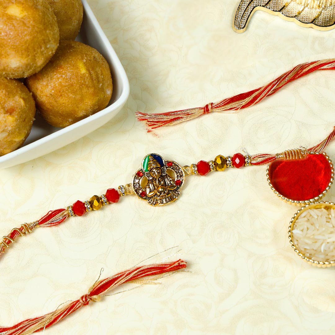 Order Ganesha Rakhi With Panjiri Laddoo Online