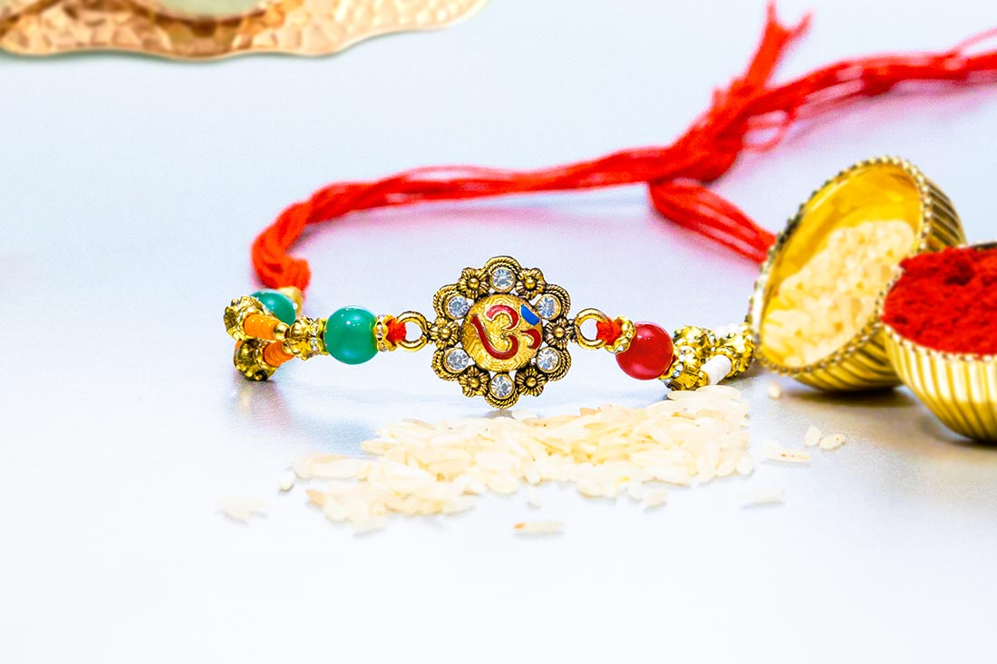 Gold plated om rakhi