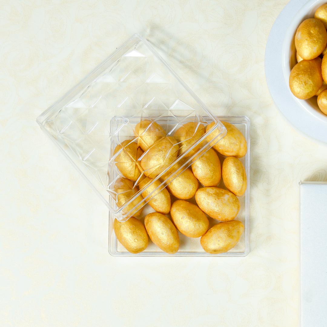 Golden Ganesh Rakhi With Panjiri Laddoo N Almond Dragees