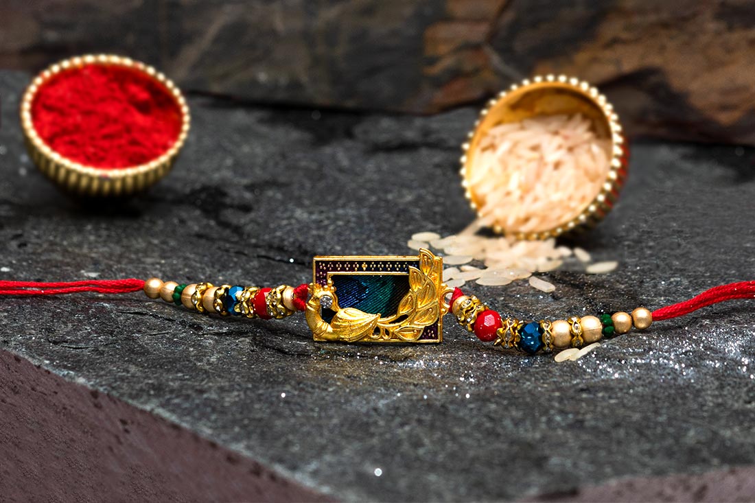 Golden toned rakhi