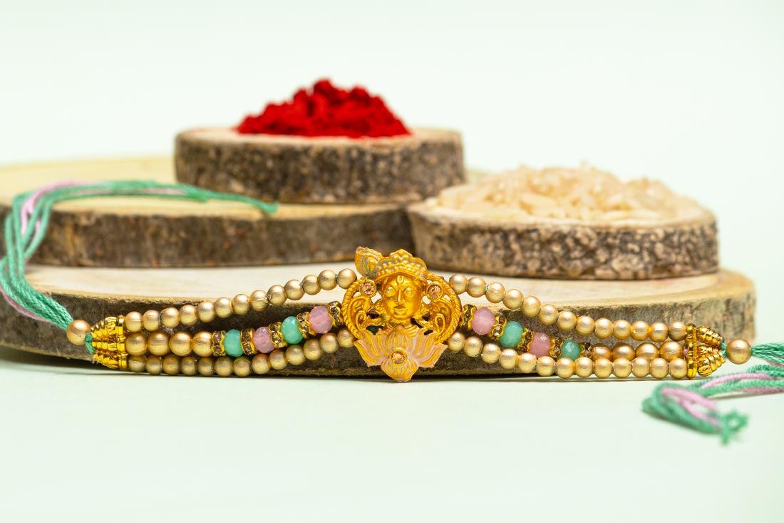 Lord krishna golden rakhi