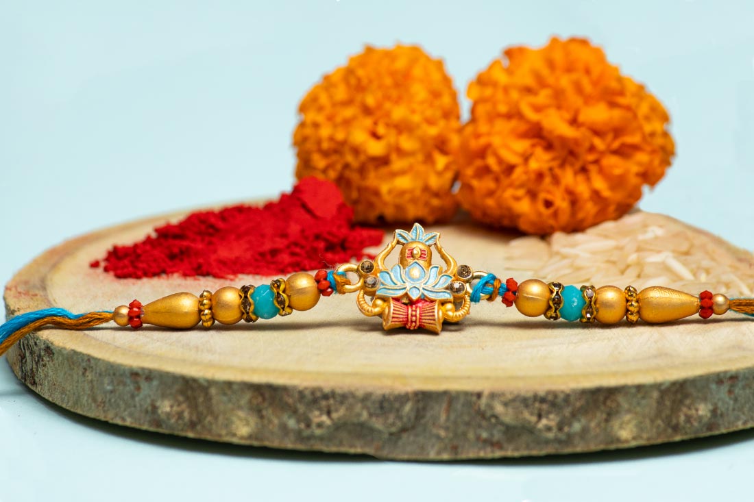 Lotus Damru Beaded Rakhi