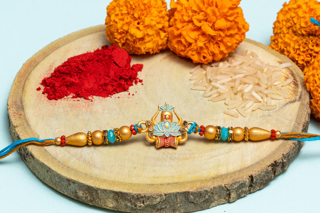 Lotus Damru beaded rakhi