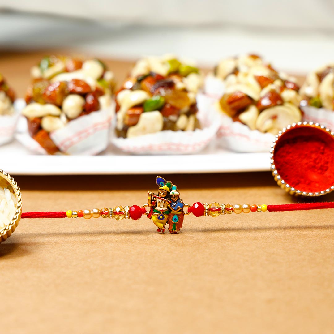 Lovely Radha Krishana Rakhi With Dry Fruit Ladoo