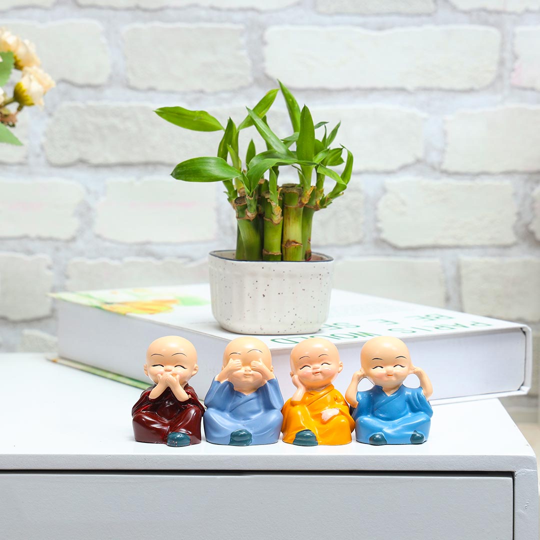 Lucky bamboo with four little monks