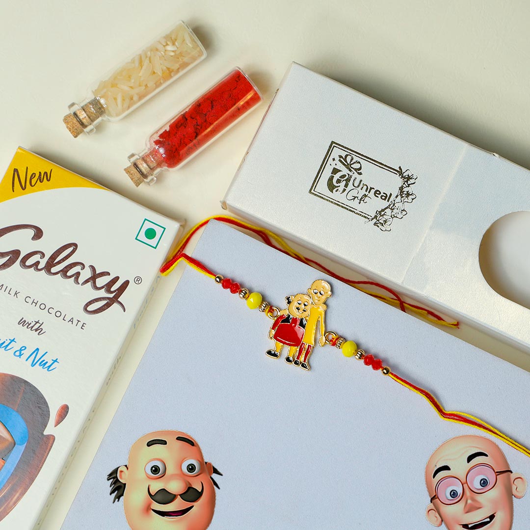 Motu Patlu Rakhi with Galaxy Fruit N Nut Chocolate Order Now