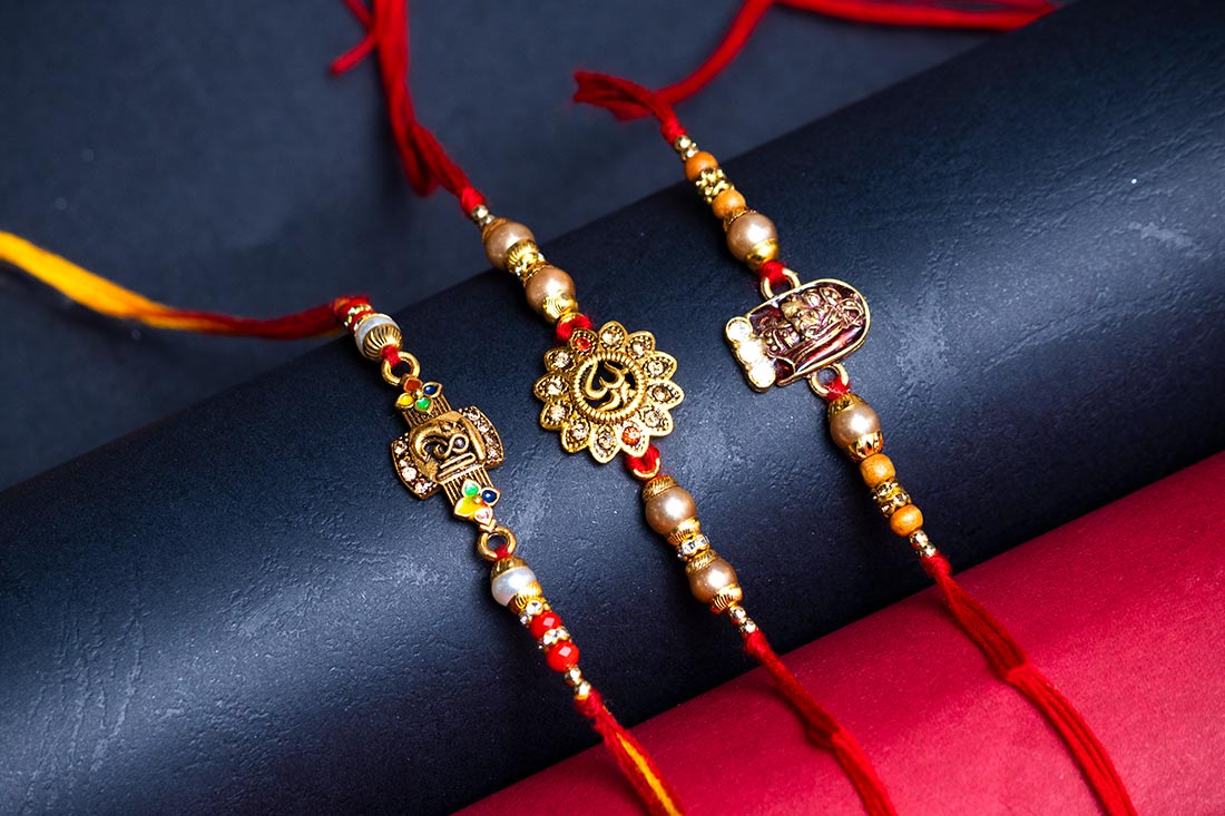 Om Krishna Ganesha Trio Rakhi