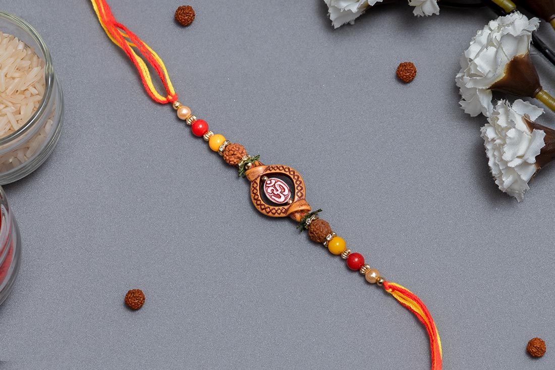 Om Rakhi And Dark Choco Set