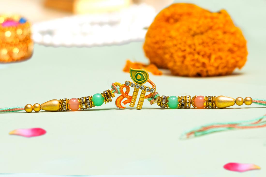 Pearl rakhi with Shree Online