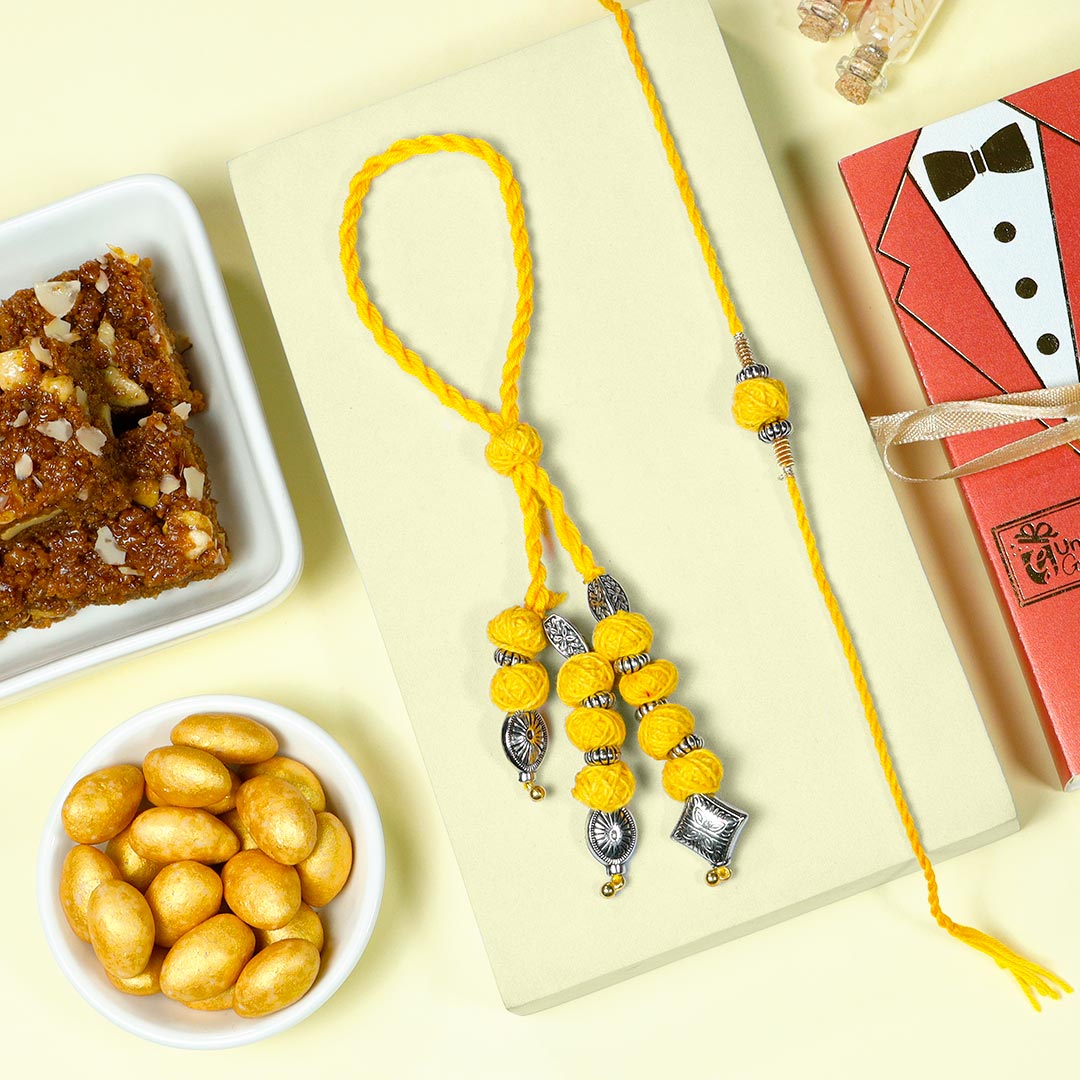 Buy Quirky Couple Rakhi Set With Dodha Burfee N Dragees Online