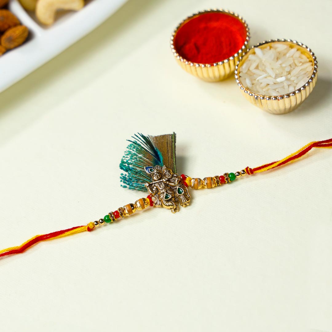 Radha-Krishna Feather Rakhi With Dry Fruits