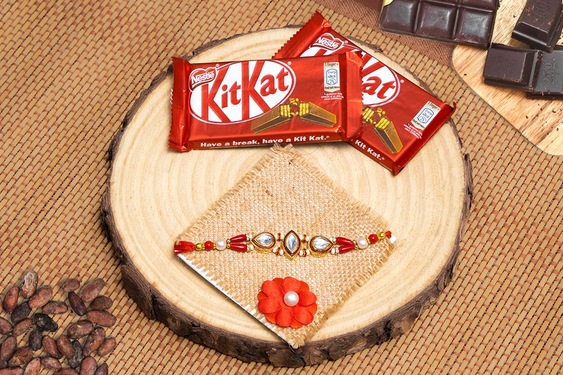 Silver Stones Embellished Rakhi With Kitkat Duo