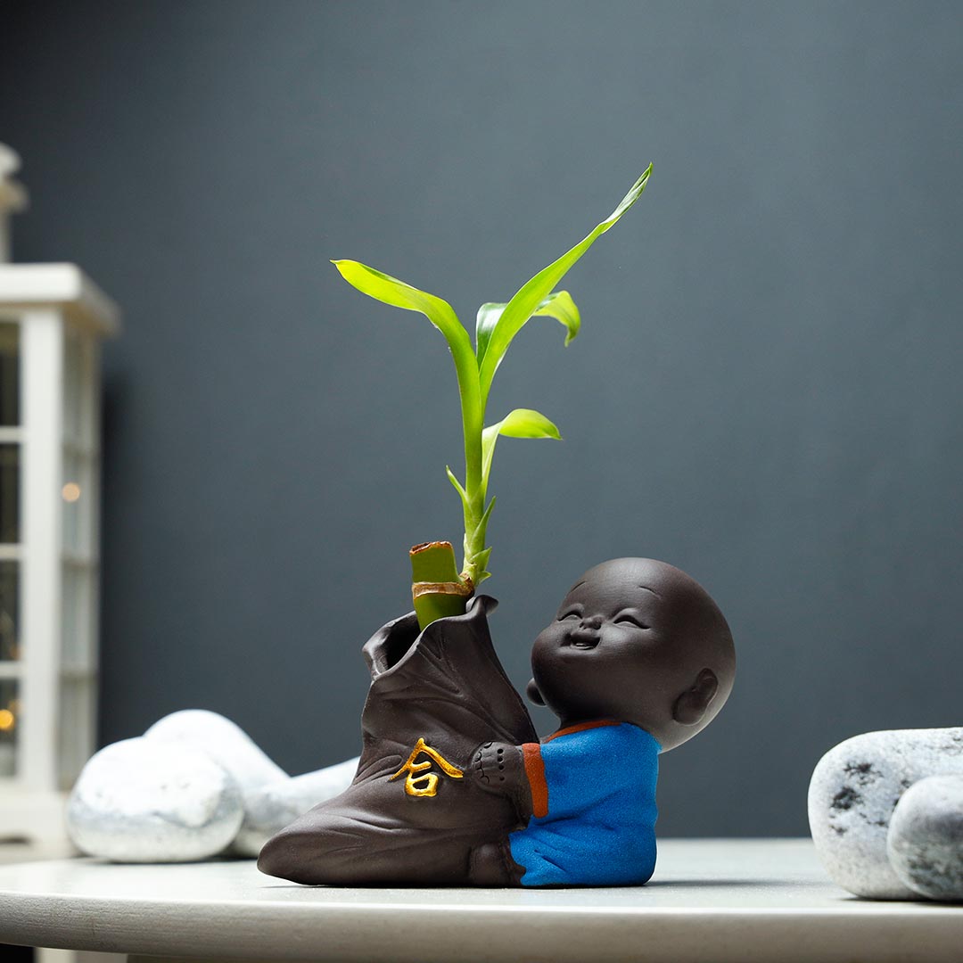 Smiling Monk Holding Goodluck Bamboo