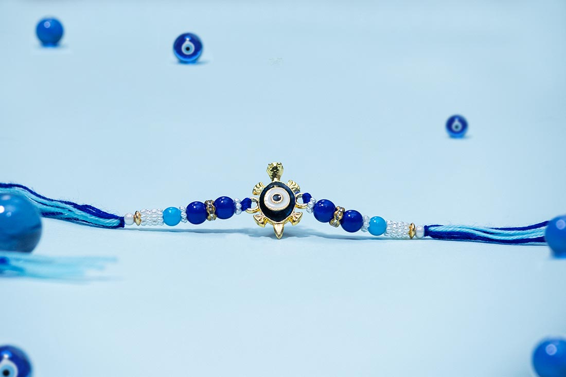 Tortoise Rakhi With Evil Eye Bracelets