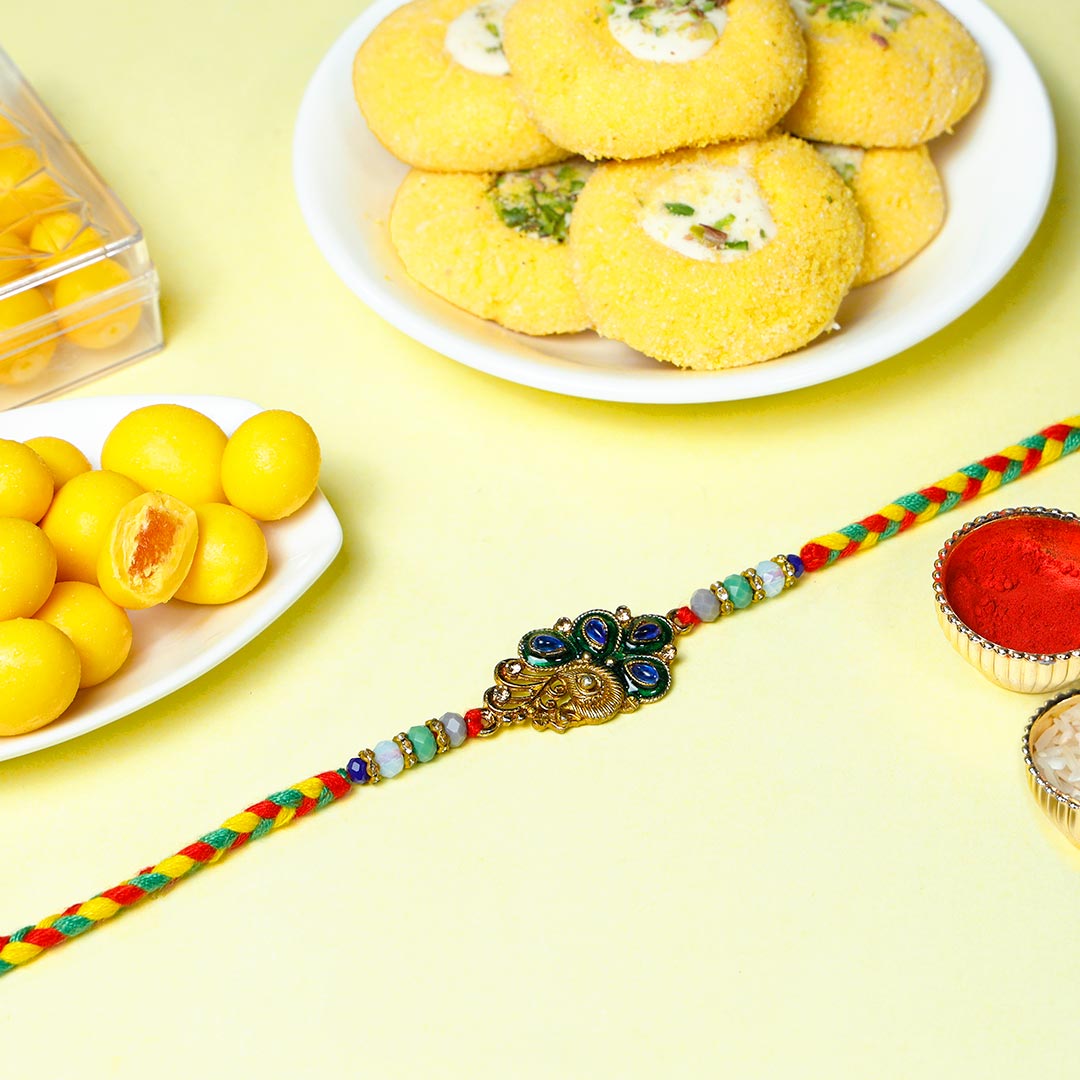 Vibrant Designer Rakhi With Cookies N Dragees