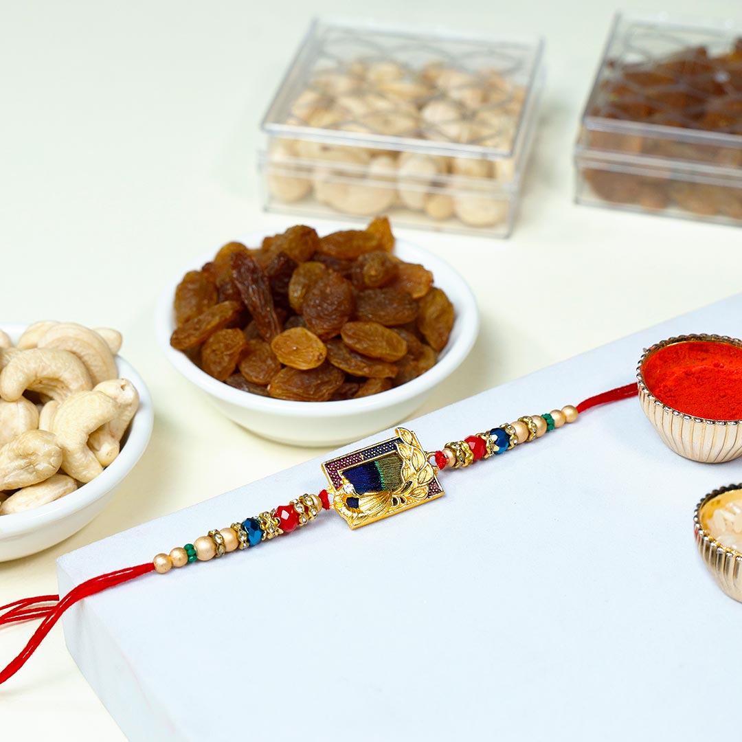 Vibrant Mauli Rakhi with Assorted Dry Fruits box